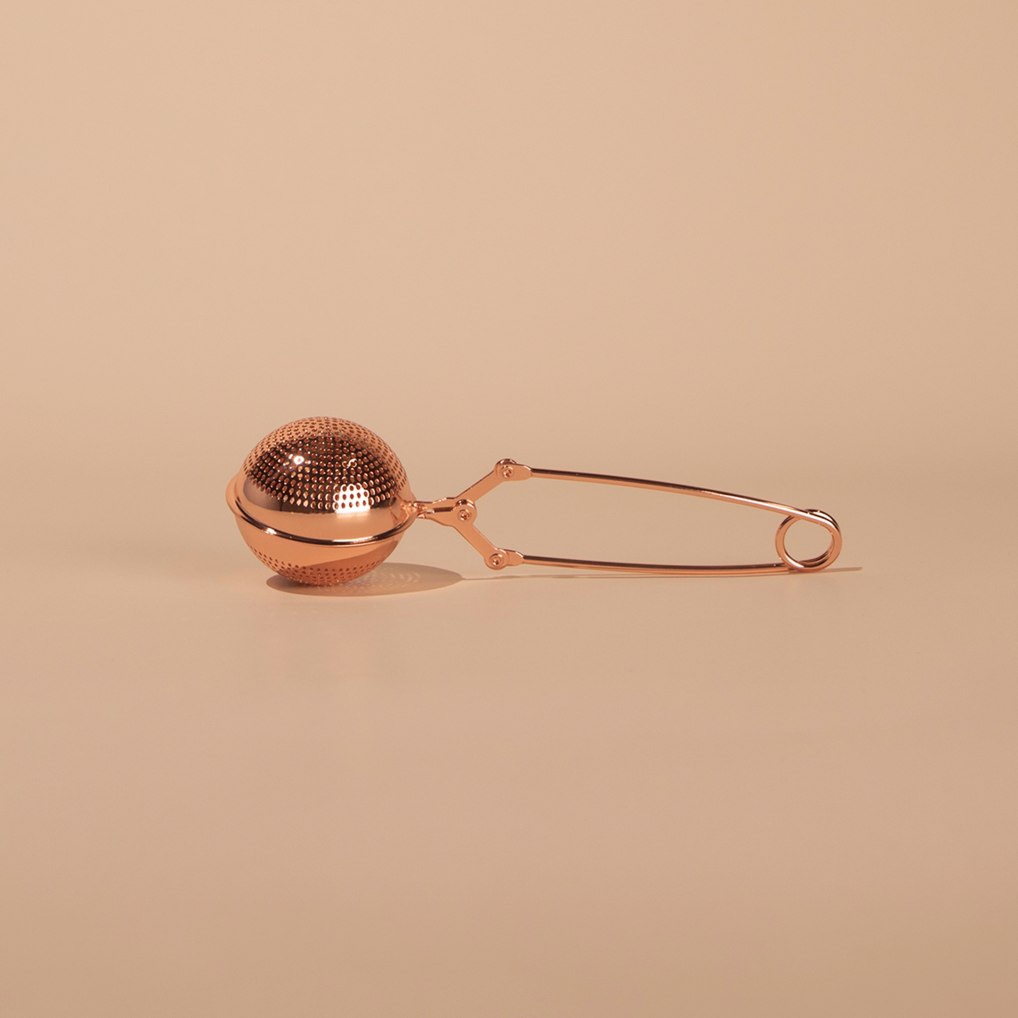 Rose gold tea ball strainer for loose leaf tea - Nurtur Tea Australia